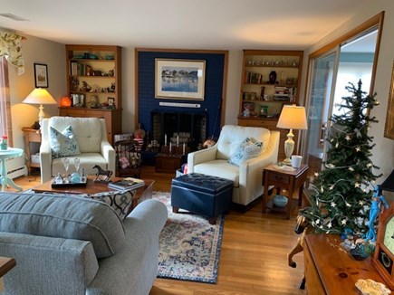 Harwich Port Cape Cod vacation rental - Living Room with hardwood floors, ample seating and fireplace