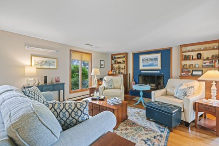 Harwich Port Cape Cod vacation rental - The blue-accented fireplace adds a bold pop to the room