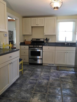 Eastham Cape Cod vacation rental - Updated kitchen with granite countertops and beadboard cabinets
