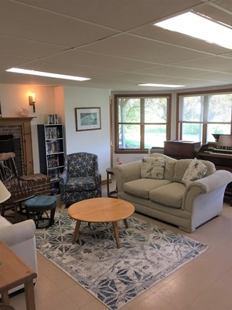 East Orleans Nauset Heights Cape Cod vacation rental - Lower level living room with sliders to walk out to back yard