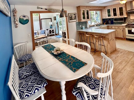 Chatham Cape Cod vacation rental - Open concept home with eat-in kitchen leading into sun-room.