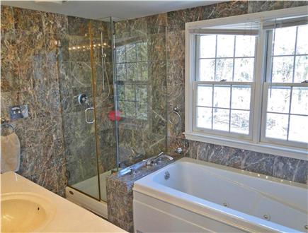 Yarmouth Cape Cod vacation rental - Master bathroom with Jacuzzi tub, walk in shower