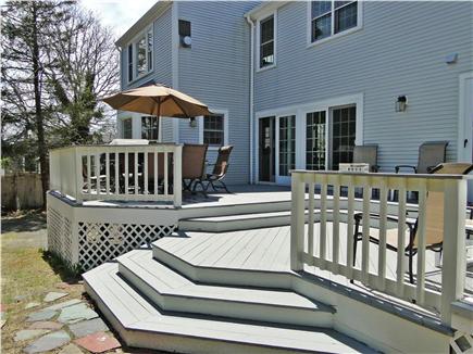 Yarmouth Cape Cod vacation rental - Sunny deck area with seating, grill, outdoor shower