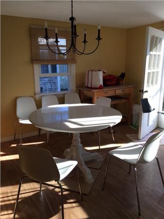 Harwichport Cape Cod vacation rental - Eat in kitchen and back door to deck with outdoor shower.