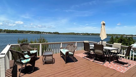 Bourne, Buzzards Bay Cape Cod vacation rental - Gorgeous waterfront view on spacious back deck off Oceanside room