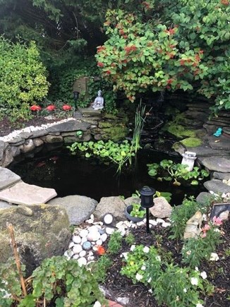 Mashpee Neck Cape Cod vacation rental - Peaceful koi pond with waterfall