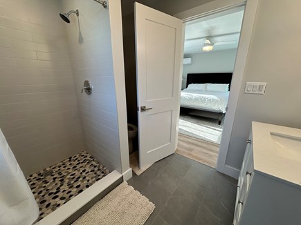 East Falmouth Cape Cod vacation rental - Main Bed 3 (2nd fl) en-suite bath w/ walk-in shower, peek water v