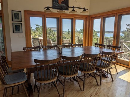 Wellfleet Cape Cod vacation rental - Dining room table comfortably sits twelve, and has a water view.