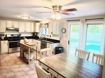 Mashpee Cape Cod vacation rental - Kitchen-Dining with sliders to pool