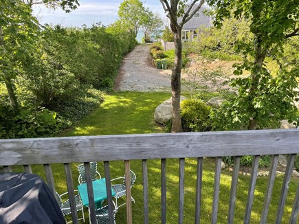 Brewster Cape Cod vacation rental - Backyard sitting area and view of the water from the deck