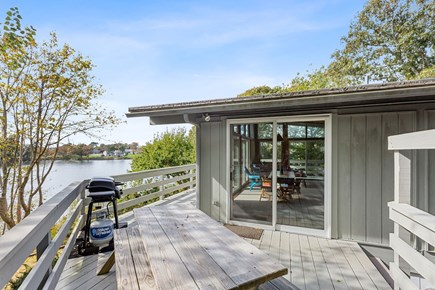 West Dennis Cape Cod vacation rental - Wrap-around deck with picnic table, grill and great views
