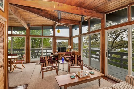 West Dennis Cape Cod vacation rental - Living room with plentiful light and windows, and TV