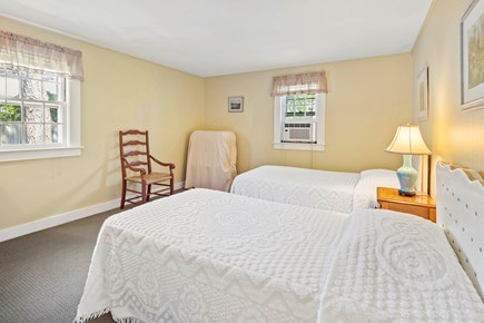 Dennis Port Cape Cod vacation rental - Bedroom with two twin beds, folded twin cot, and window A/C