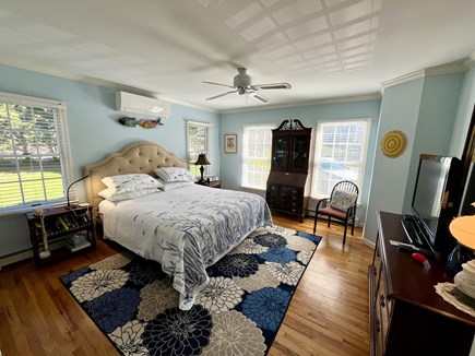 East Orleans, MA Cape Cod vacation rental - Main level primary bedroom with king bed and attached bath