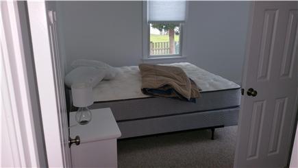 Harwichport Cape Cod vacation rental - First floor bedroom with queen and half bath