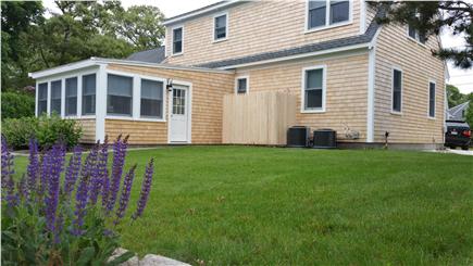 Harwichport Cape Cod vacation rental - Back of house and large landscaped yard