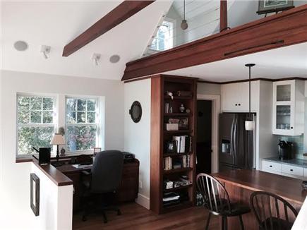 East Orleans Cape Cod vacation rental - View of Desk Area/Half Bath/Kitchen and Loft From Family Room