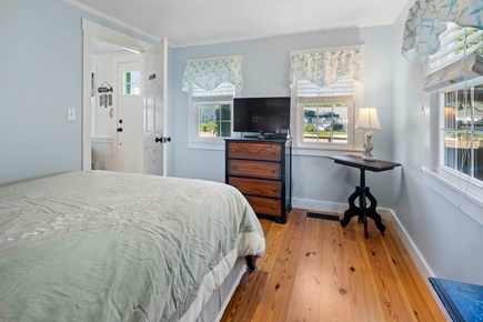 Dennis Port Cape Cod vacation rental - First floor bedroom with queen bed and TV