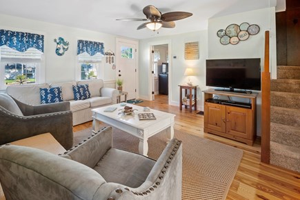 Dennis Port Cape Cod vacation rental - Living room with couch, chairs and TV