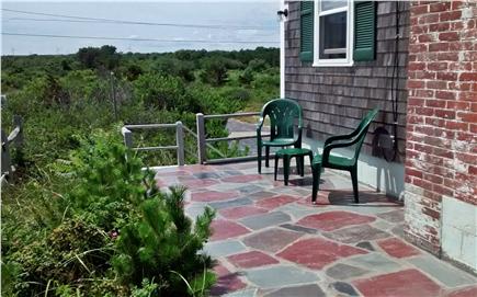 Sagamore Beach Cape Cod vacation rental - Flagstone patio, view of the meadow across the road