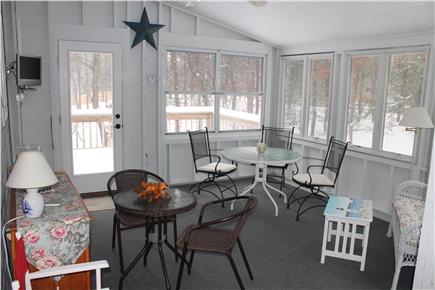 Eastham Cape Cod vacation rental - Screened in porch with television