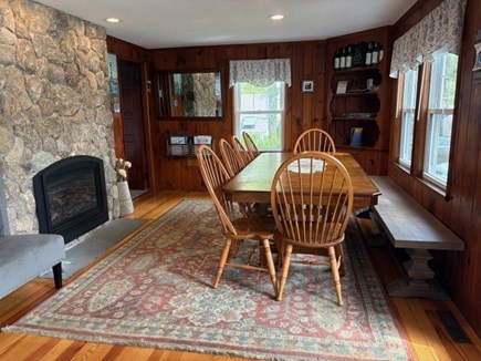Dennis Port Cape Cod vacation rental - Dining area with plenty of seating and gas fireplace.