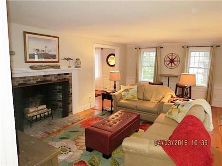 Brewster on Orleans border Cape Cod vacation rental - Family room with 55'' HD tv, Blue-Ray, games, books