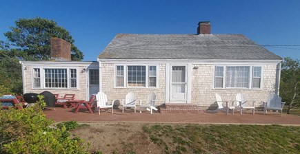 North Chatham Cape Cod vacation rental - Front of House with New Patio facing Pleasant Bay - June 2023