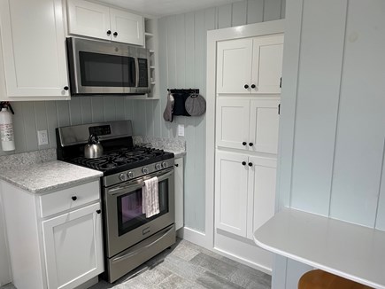 Eastham Cape Cod vacation rental - Stove, microwave and pantry