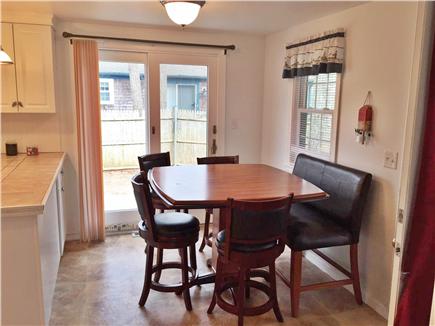 Yarmouth Cape Cod vacation rental - A cozy dining area with sliders to new patio and back yard