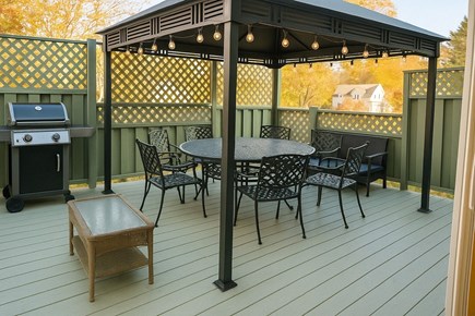 Plymouth, Priscilla Beach MA vacation rental - Back deck eating area with Weber propane grille