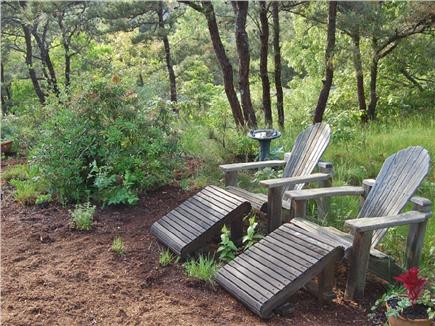 Truro Cape Cod vacation rental - One of many seating areas in gardens. Only the birds can see you!