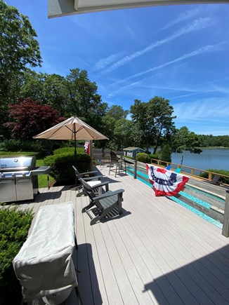 Cotuit Cape Cod vacation rental - A view from the upper deck overlooking the pool and bay