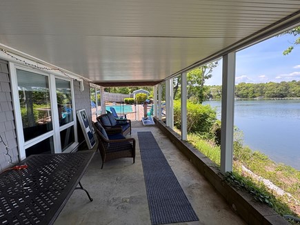 Cotuit Cape Cod vacation rental - Screened in deck overlooking the Bay.