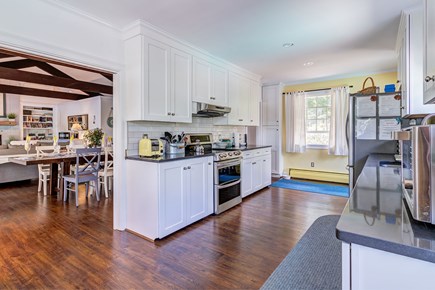 Cotuit Cape Cod vacation rental - The main kitchen with access to the upper deck for grilling