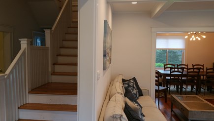 Harwichport Cape Cod vacation rental - Living room and stairway to 3 upstairs bedrooms