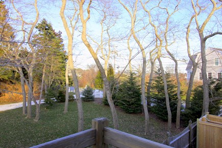 Chatham downtown village Cape Cod vacation rental - Lookout queen bedroom balcony has seasonal filtered ocean views