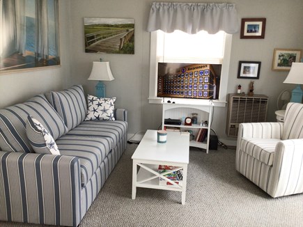 Eastham Cape Cod vacation rental - TV time?  Sofa and chairs calling your name.