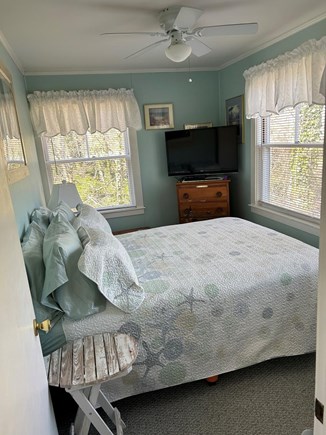 Eastham Cape Cod vacation rental - The Master. New Queen Bed. TV. Large windows. Ceiling fan