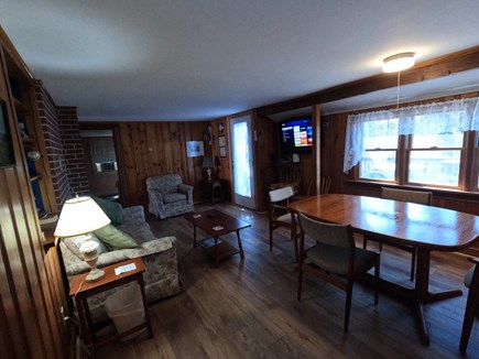 South Chatham Cape Cod vacation rental - A view of the living room & dining area  from the other side.