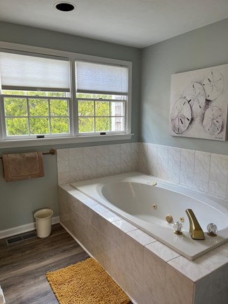 Eastham Cape Cod vacation rental - Master bath with jacuzzi tub & stand up shower