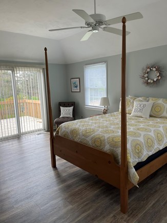 Eastham Cape Cod vacation rental - Master bedroom with sliding glass doors to large deck