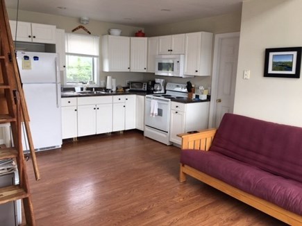Mattapoisett. Angelica Point. MA vacation rental - Living/kitchen, futon, full bath on main level. Stairs to loft.