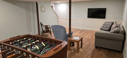 eastham Cape Cod vacation rental - New finished room in basement with TV and Foosball table.