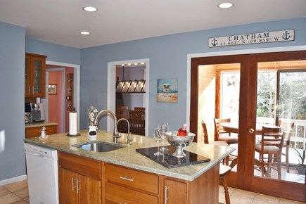 Chatham Cape Cod vacation rental - Well stocked kitchen is open to the sunroom. Plenty of pots pans
