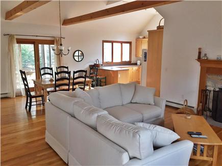 North Eastham Cape Cod vacation rental - Open living room leads to kitchen and to the screened in porch.