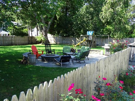 Falmouth Heights Cape Cod vacation rental - Back yard offer firepit, plenty of space, fully fenced