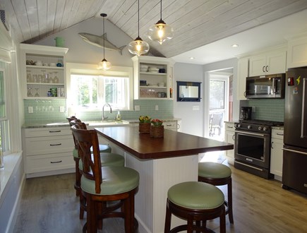 Falmouth Heights Cape Cod vacation rental - Kitchen with new microwave and oven, breakfast bar