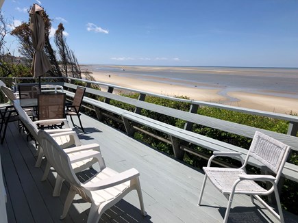 East Brewster Cape Cod vacation rental - Spacious deck overlooking the bay with a stairway to the beach.