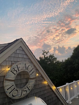 Sandwich, Sagamore Beach Cape Cod vacation rental - Back deck dinner sunset